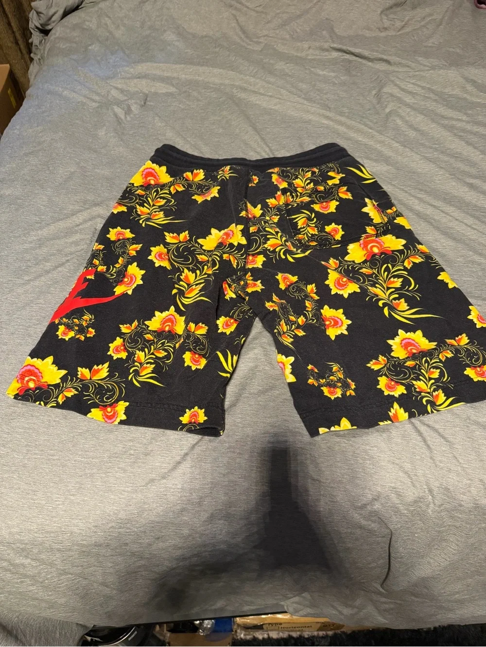 Nike Men’s Black Athletic Shorts with Yellow & Red Floral Design